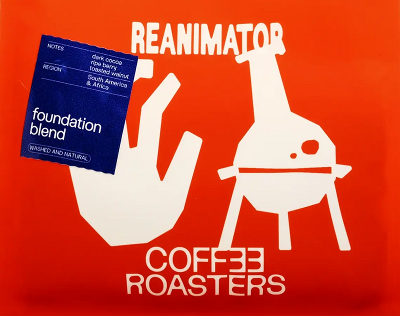 Coffee roasters' bag with a hand holding a coffee bag and a roaster on an orange background